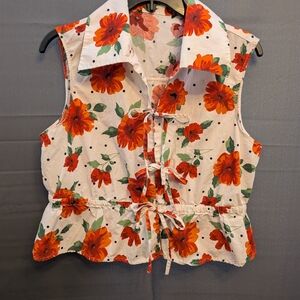 Sleeveless Tie-Front Floral Blouse - White with Black Polka Dots And Red Flowers